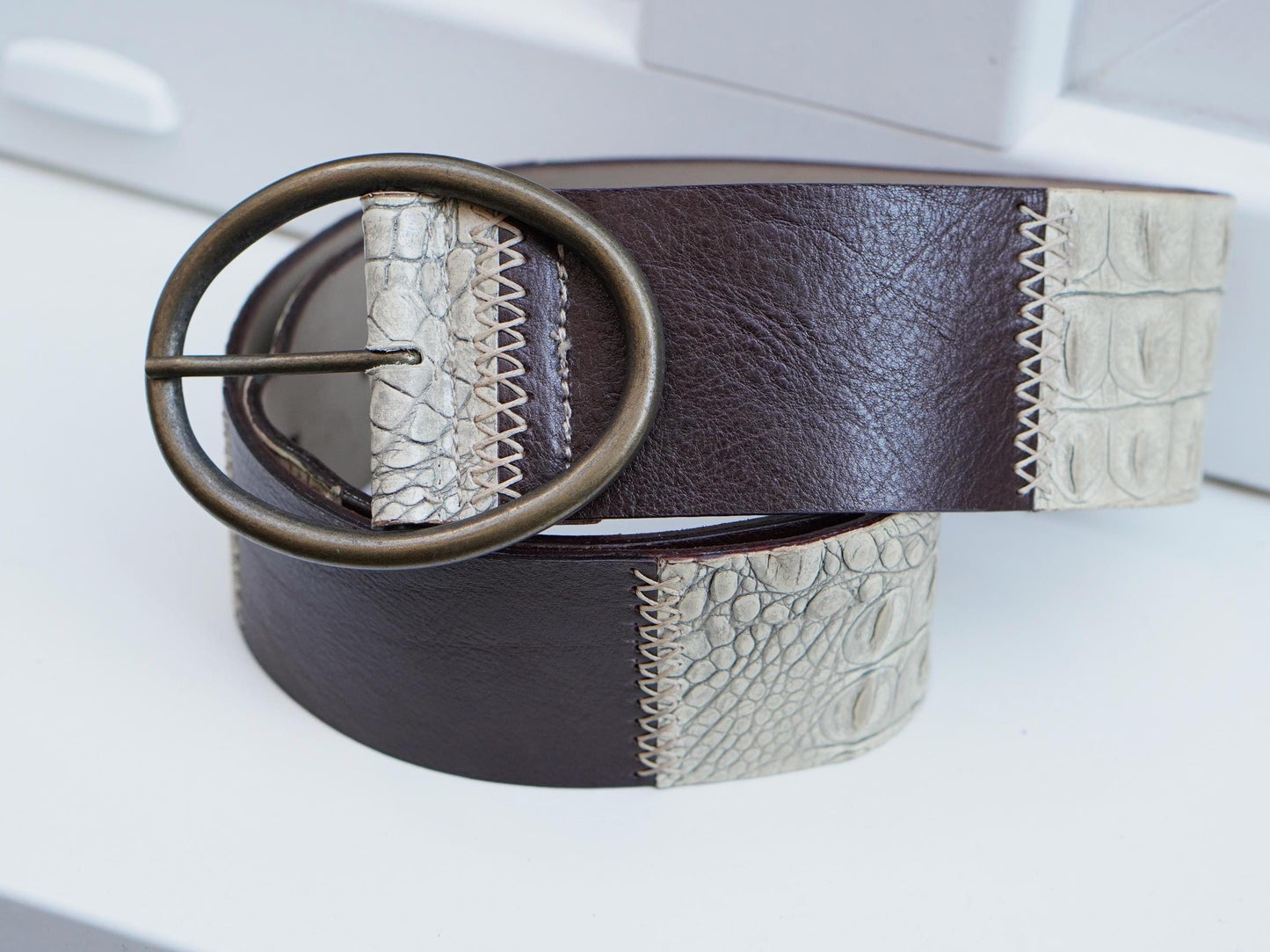 Vintage Brown leather belt with crocodile embossed details and brass buckle.