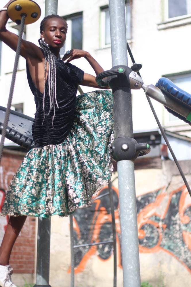 Vintage 80s drop waist prom dress in black and green with floral shimmery skirt