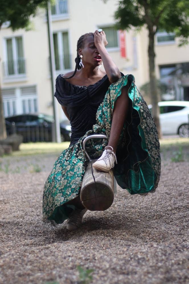 Vintage 80s drop waist prom dress in black and green with floral shimmery skirt