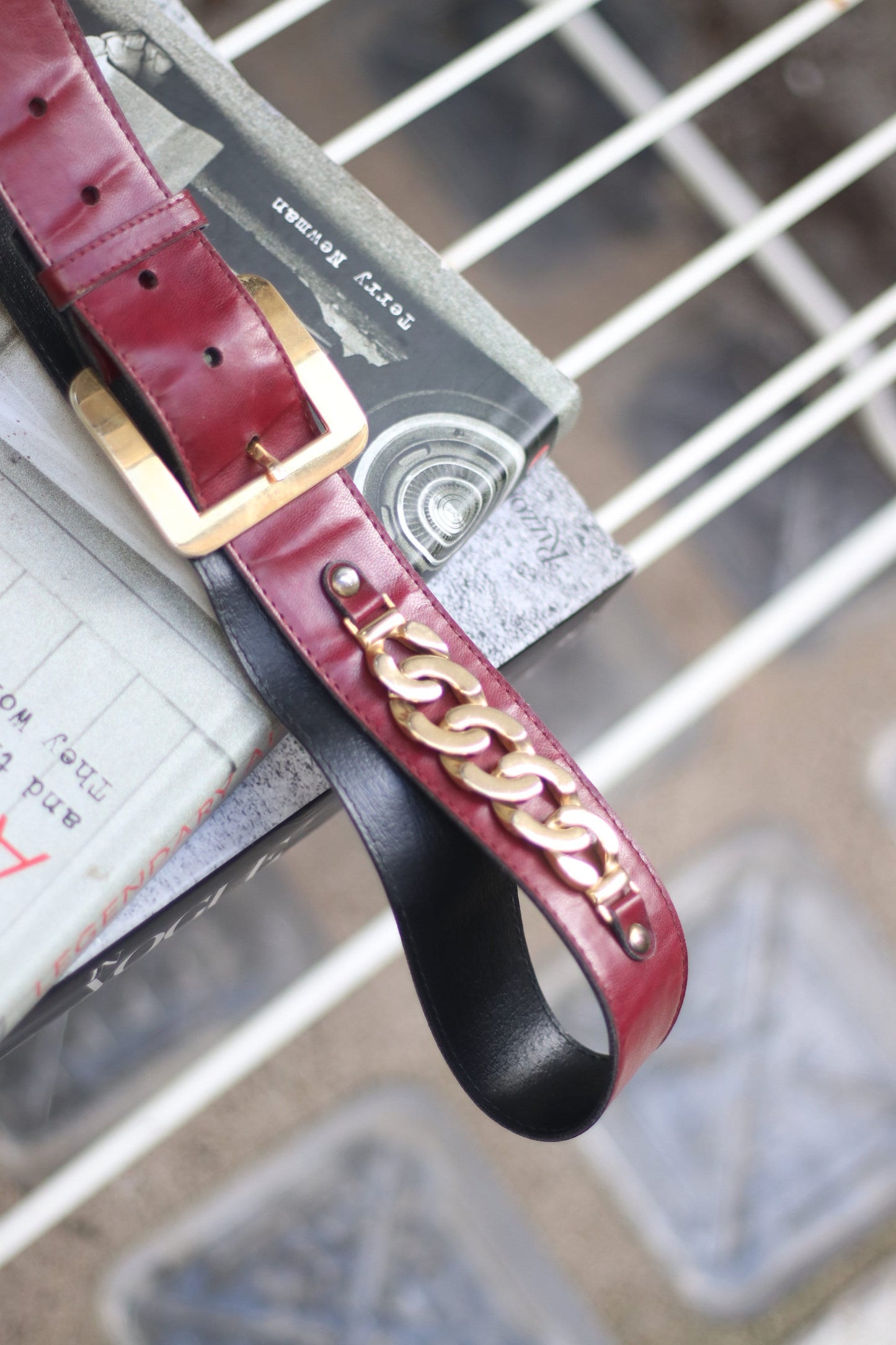 Vintage red belt with gold-colored buckle detail 70s statement retro belt