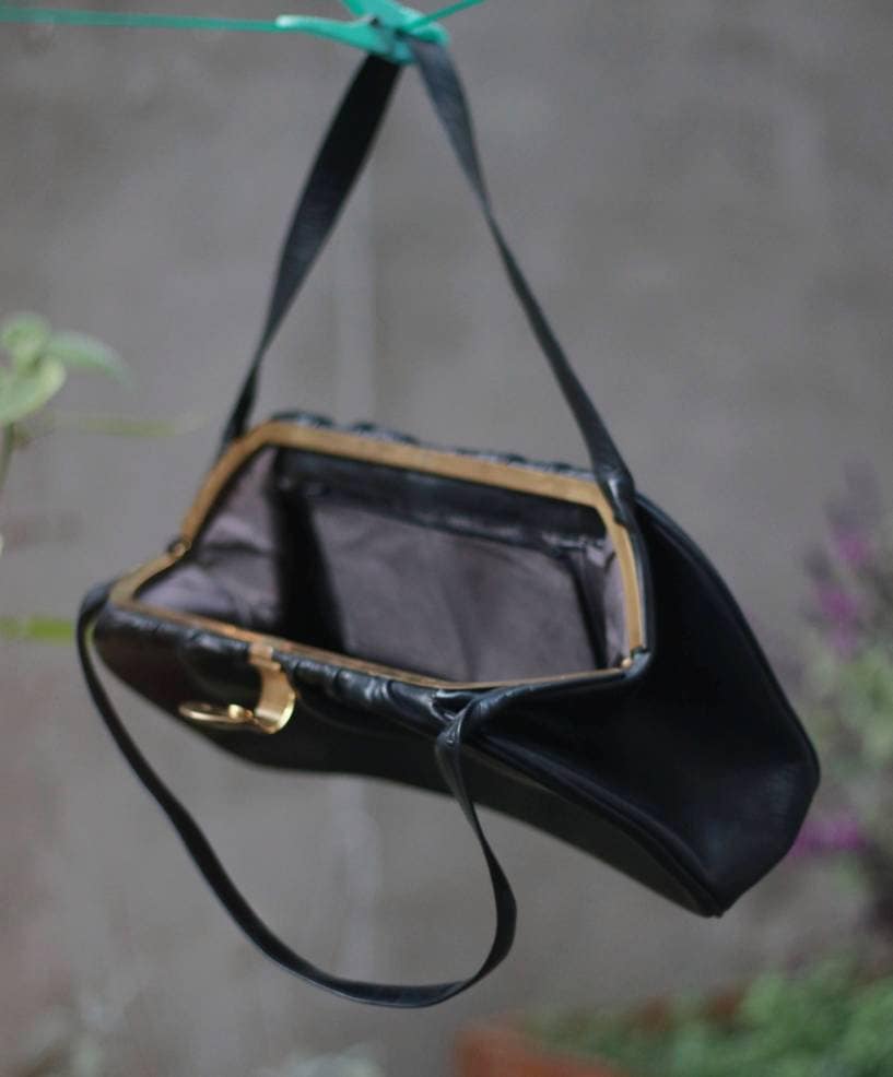 70s black classic handbag | Minimalist Vintage leather shoulderbag with statement closure details| Capsule collection bag