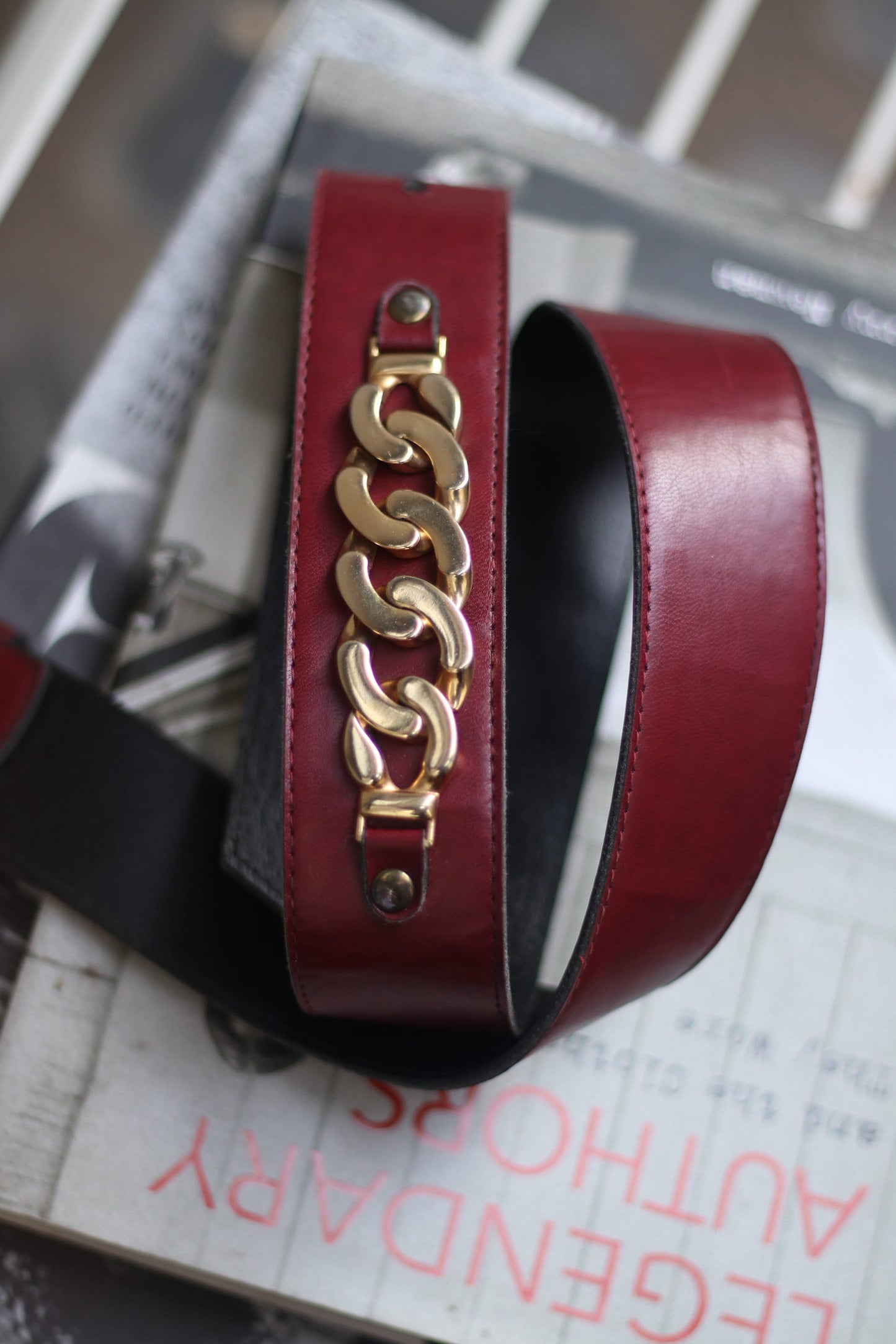 Vintage red belt with gold-colored buckle detail 70s statement retro belt