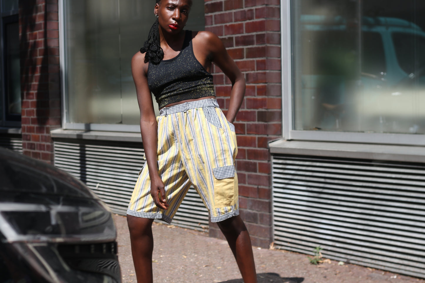 Yellow striped high-waisted shorts with patch pockets