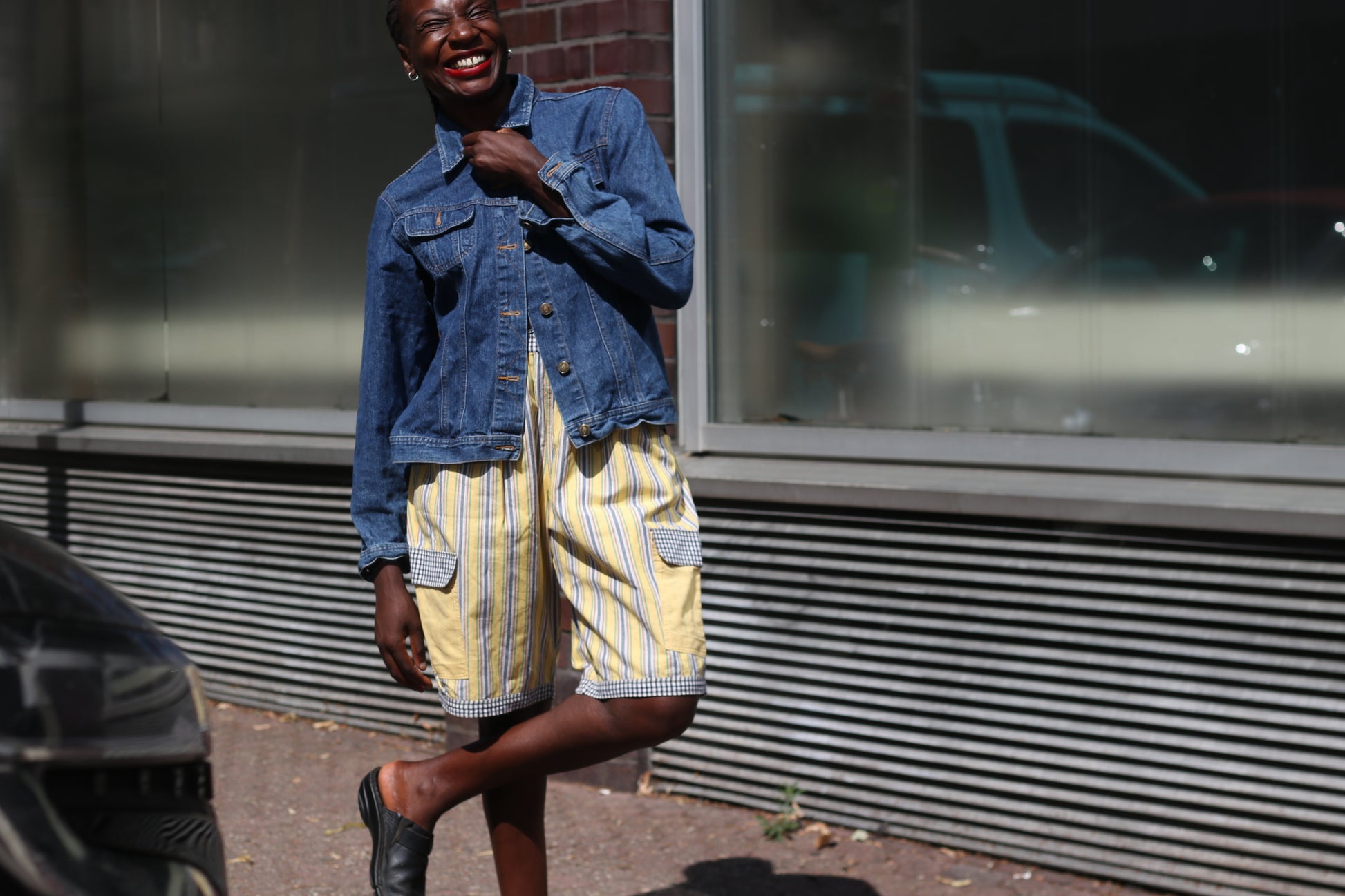 Yellow striped high-waisted shorts with patch pockets