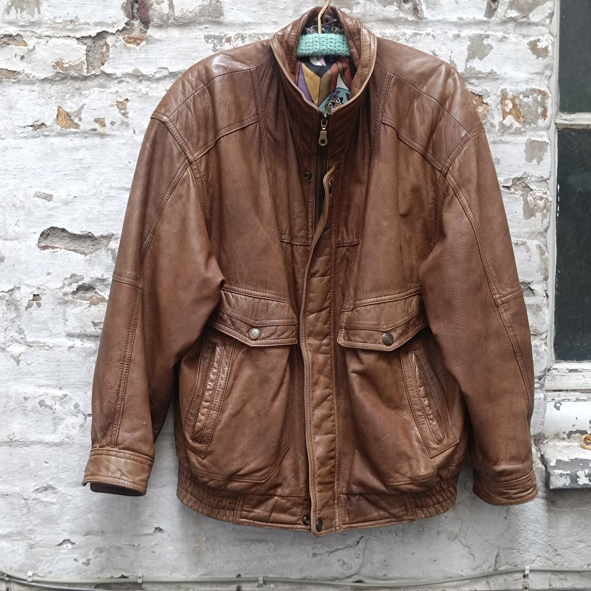 Vintage 1980s Brown Leather Bomber Jacket abstract patterned lining oversized M