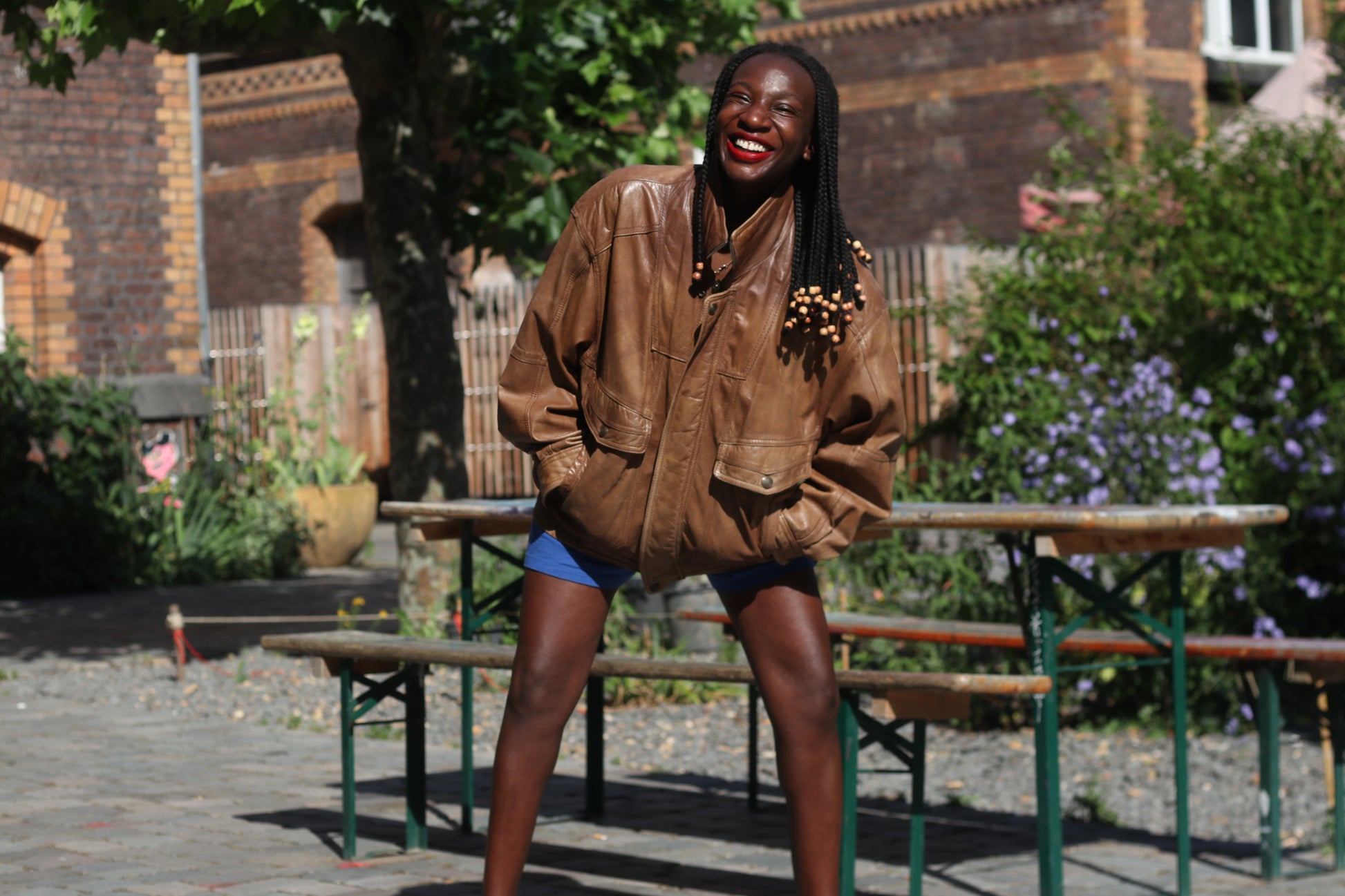 Vintage 1980s Brown Leather Bomber Jacket abstract patterned lining oversized M