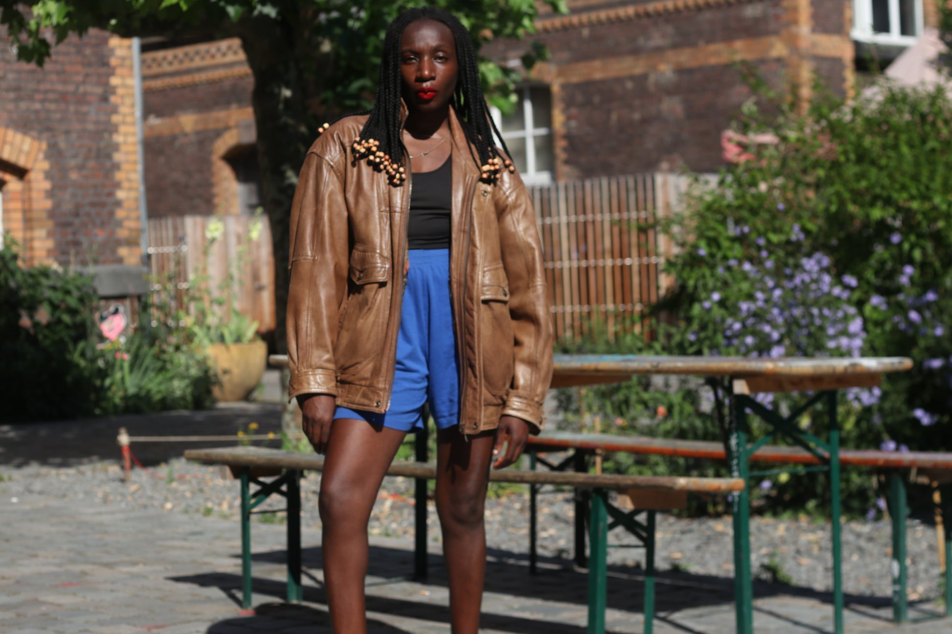 Vintage 1980s Brown Leather Bomber Jacket abstract patterned lining oversized M