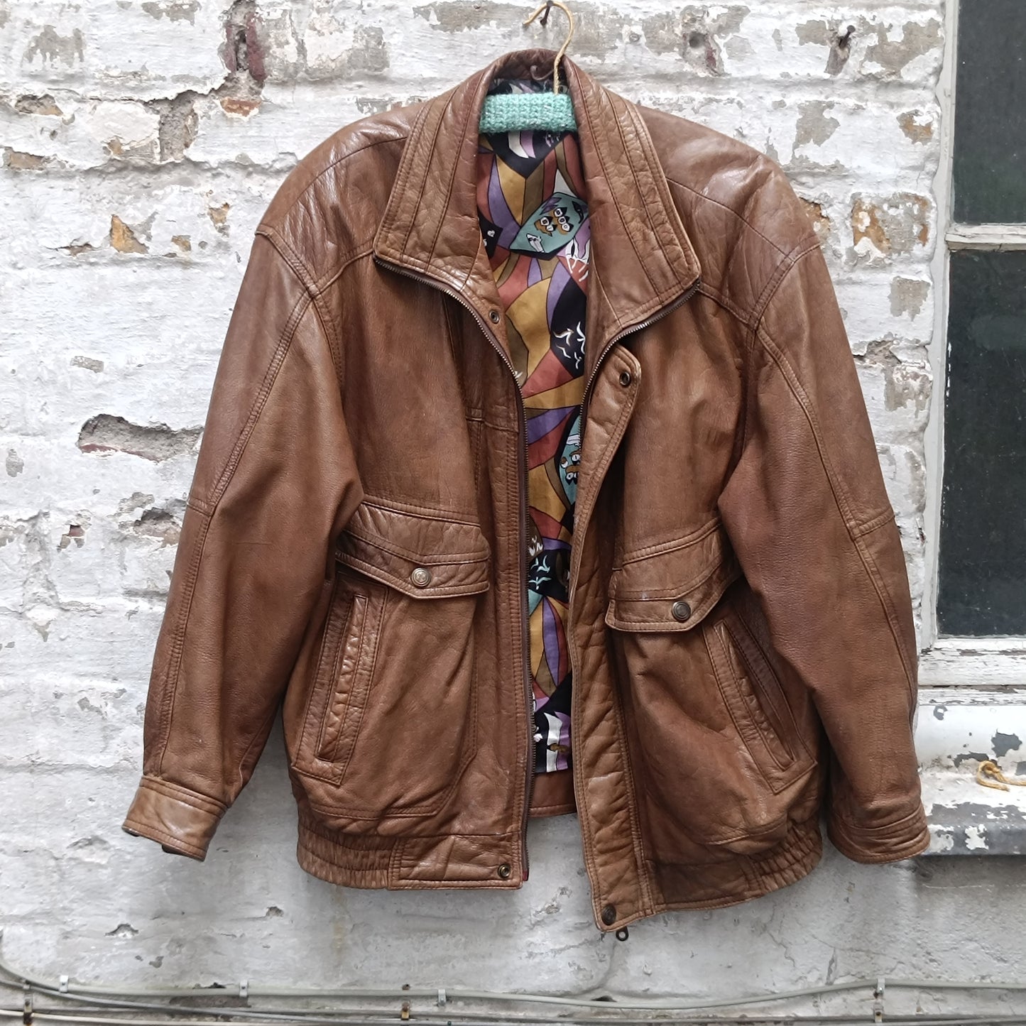 Vintage 1980s Brown Leather Bomber Jacket abstract patterned lining oversized M