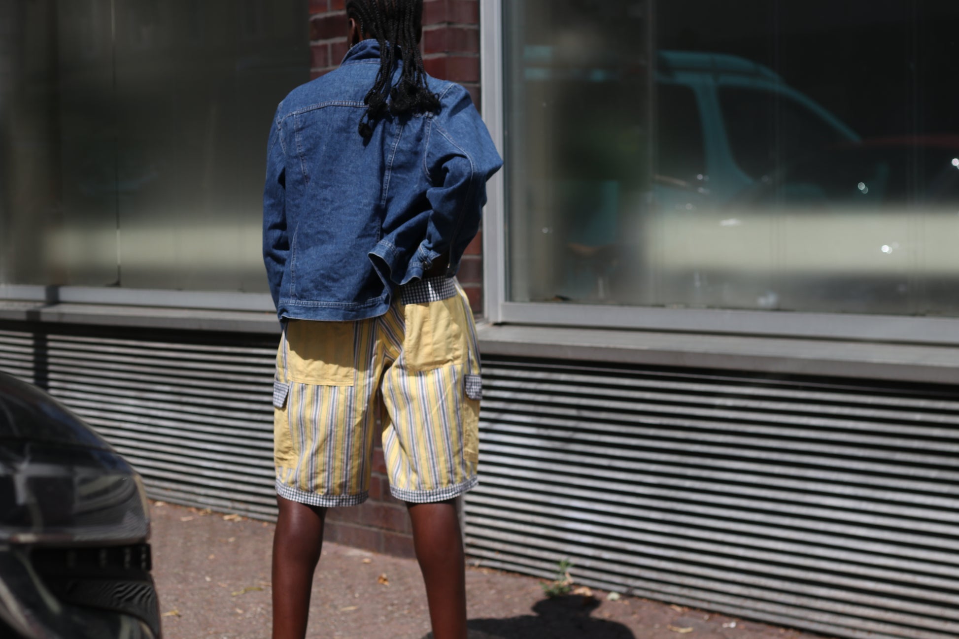 Yellow striped high-waisted shorts with patch pockets
