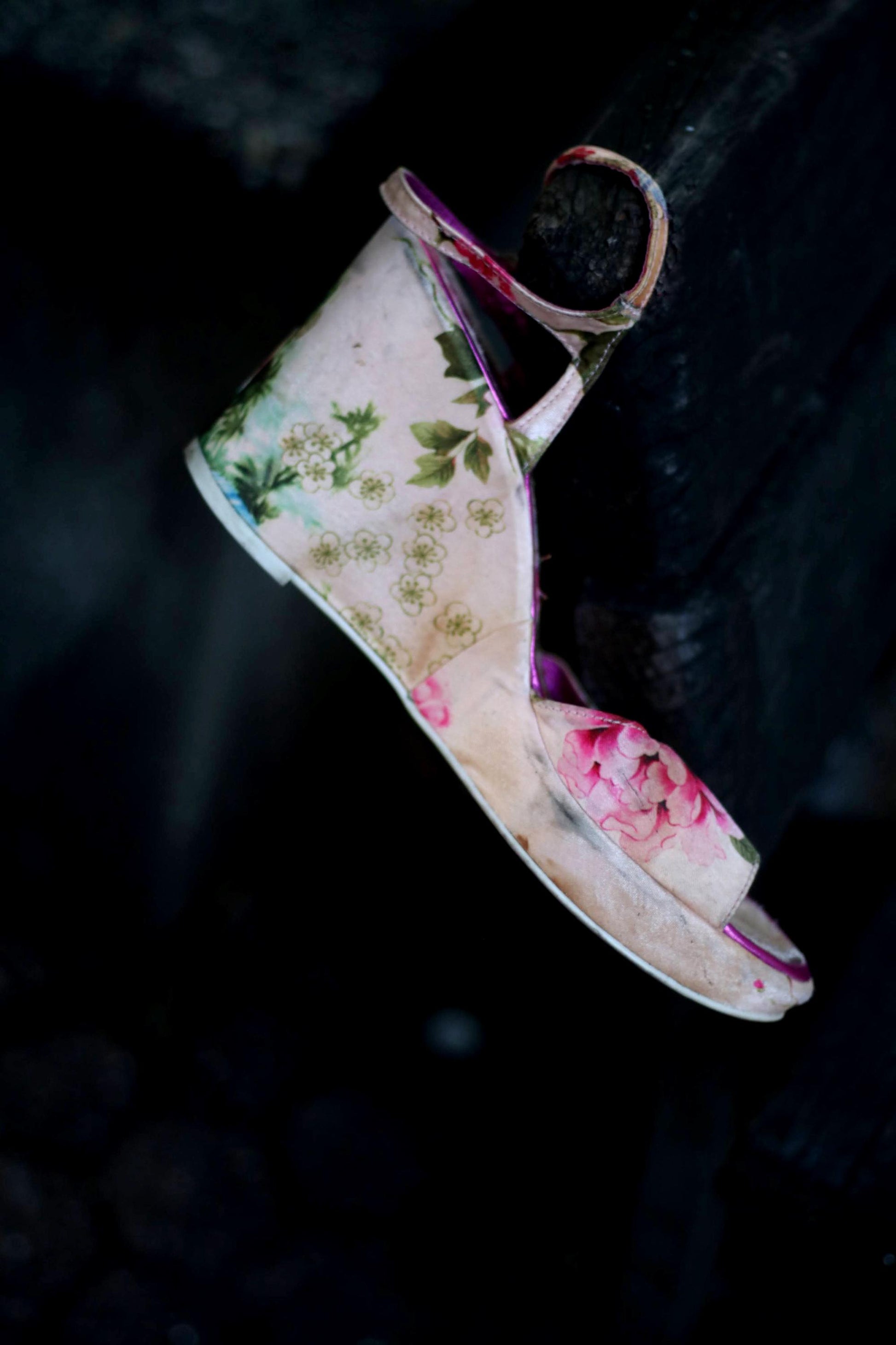 Bold pink Y2K wedges from Young Spirit with vibrant flower power design, the vintage summer sandals are featured on a clean, neutral background for maximum visual impact.