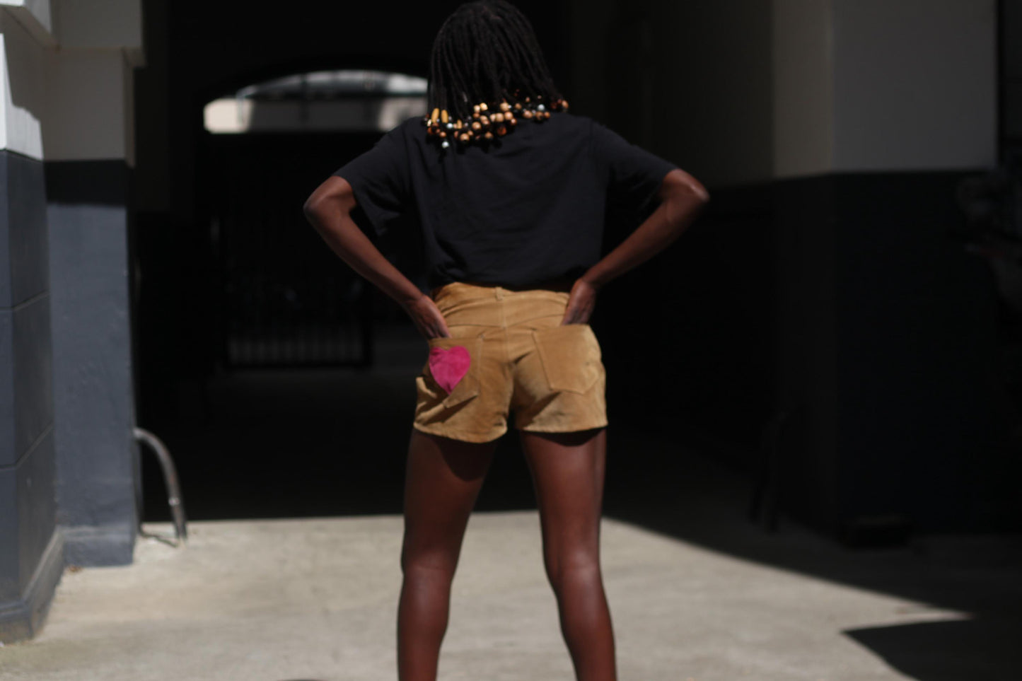 Vintage 70s Suede Shorts: High-Waisted Brown Leather with Heart Patchwork