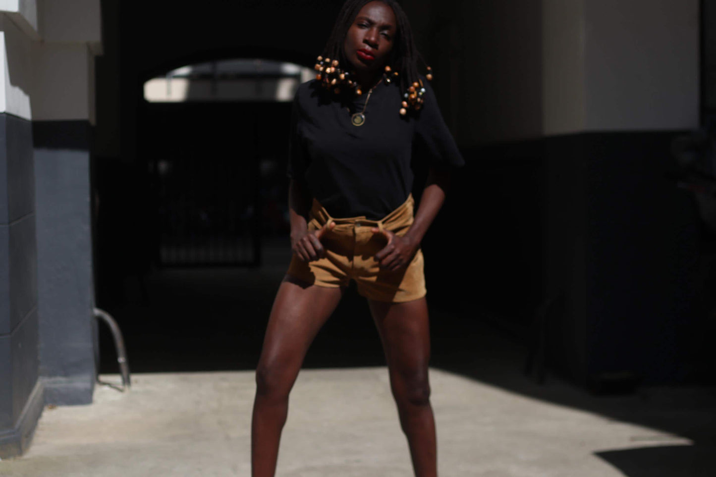 Vintage 70s Suede Shorts: High-Waisted Brown Leather with Heart Patchwork