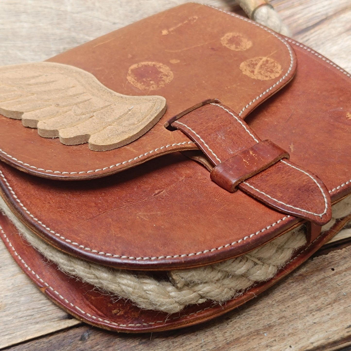 Vintage Sculptural Tan Leather Saddle Bag Rope Detail Wooden Wing Appliqué Boho