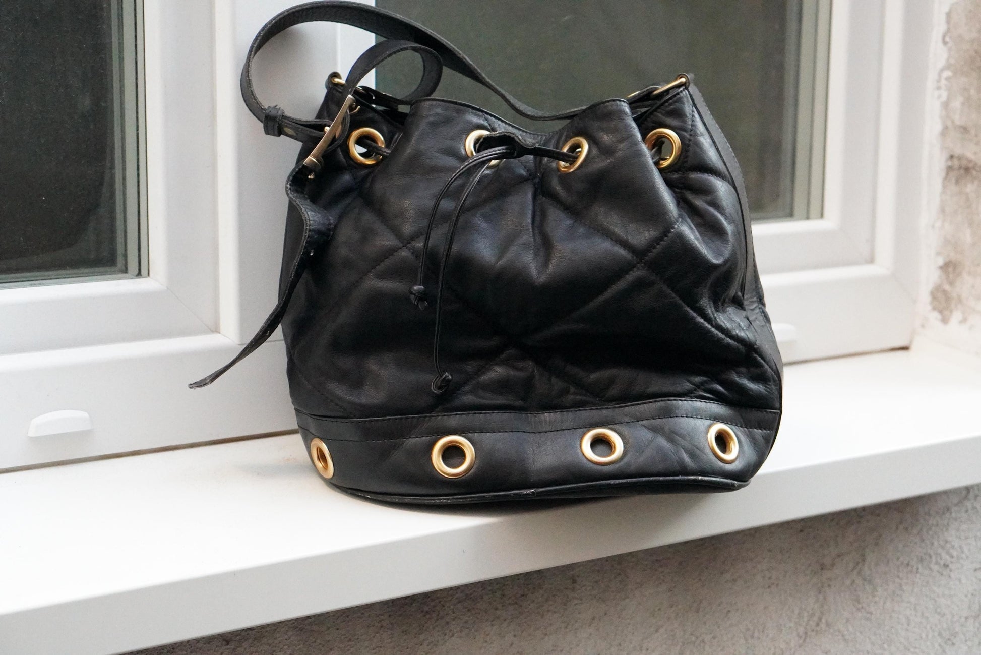 Vintage Quilted Black Leather Bucket Bag Made in Italy Gold Grommet Drawstring