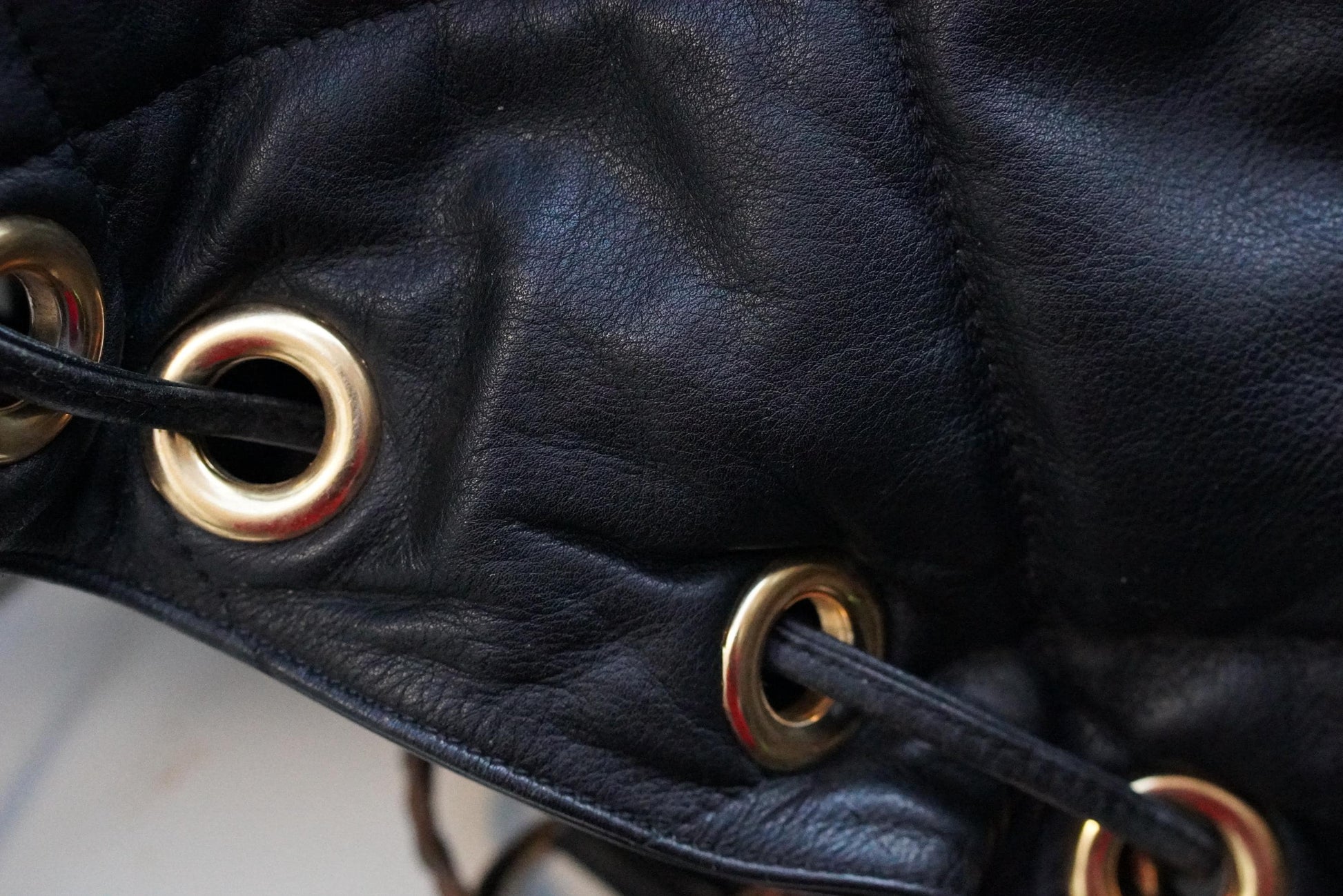 Vintage Quilted Black Leather Bucket Bag Made in Italy Gold Grommet Drawstring