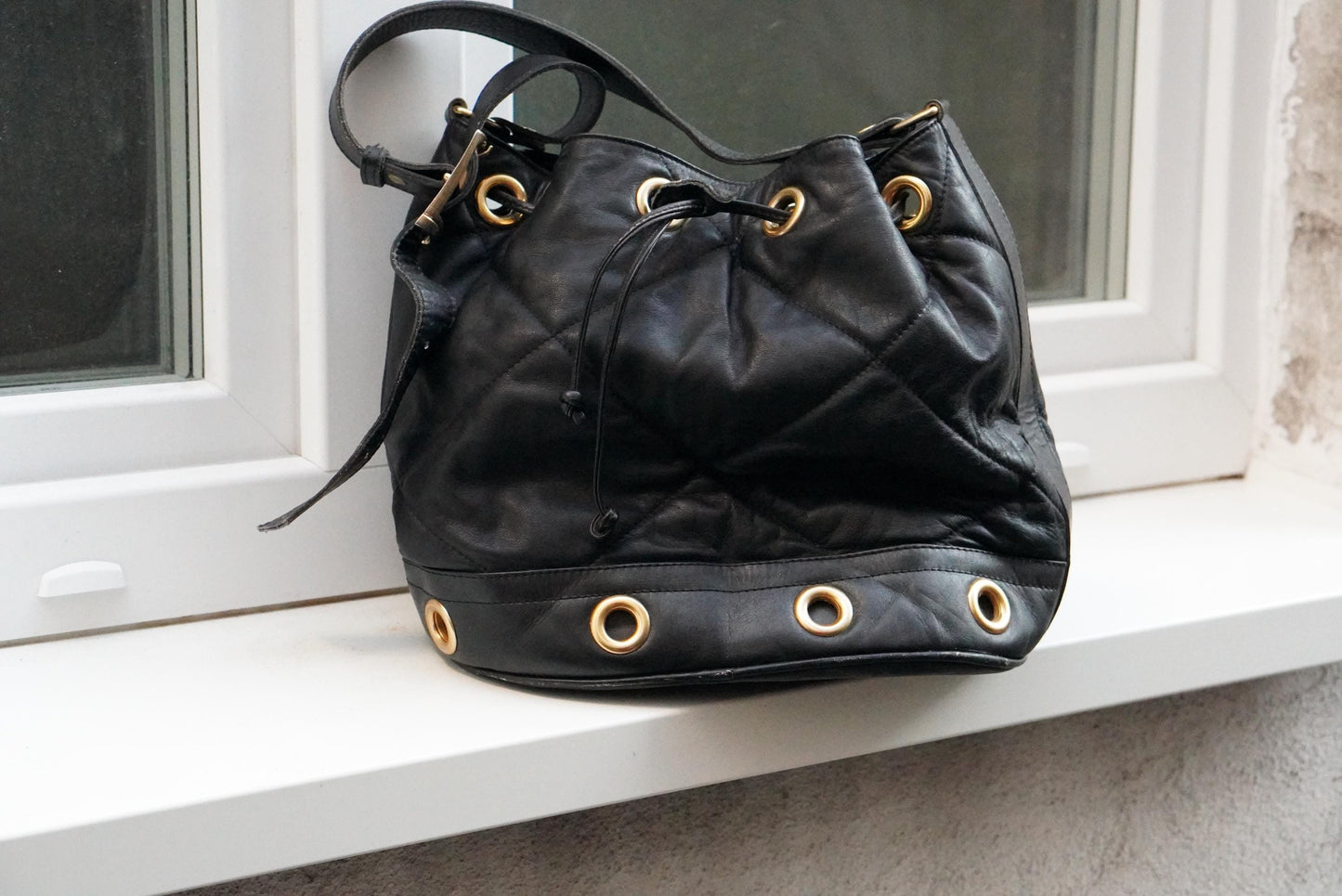 Vintage Quilted Black Leather Bucket Bag Made in Italy Gold Grommet Drawstring